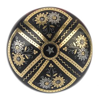 A late 19th century pique tortoiseshell brooch. The central star accent, within a floral quatrefoil