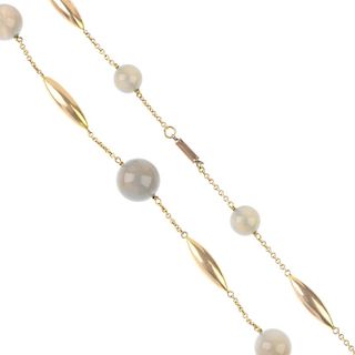 An early 20th century gold agate bead necklace. Designed as a series of graduated polished grey agat