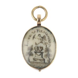 An early 19th century gold mourning pendant. Of oval outline, the painted ivory panel reading Look a