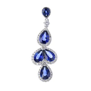 * A sapphire and diamond pendant. Designed as a pear-shape sapphire and brilliant-cut diamond cluste