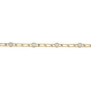 A diamond bracelet. Designed as a series of brilliant-cut diamond collets, to the elongated curb-lin
