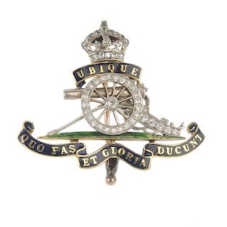An early 20th century platinum and 18ct gold enamel and diamond Royal Artillery brooch. Estimated to