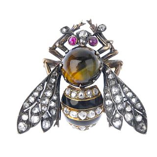 A late 19th century silver and 18ct gold tiger's-eye, enamel and diamond bee brooch. The striped bla