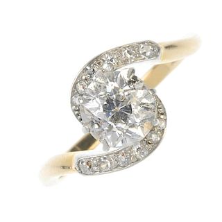 A mid 20th century 18ct gold diamond crossover ring. The old-cut diamond, with similarly-cut diamond