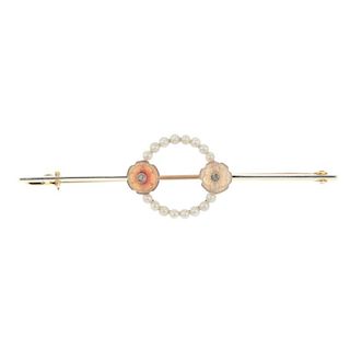 An early 20th century gold, seed pearl, diamond and agate brooch. The seed pearl wreath, with diamon