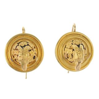 A pair of mid 19th century 18ct gold Etruscan revival earrings, circa 1860. Each of circular outline