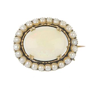 An opal and split pearl brooch. The oval opal cabochon, within a split pearl surround. Length 2.6cms