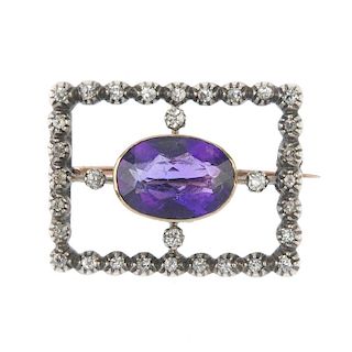 A late 19th century silver and gold amethyst and diamond brooch. The oval-shape amethyst collet, wit