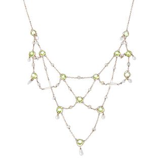 A peridot and pearl fringe necklace. The peridot and pearl lattice, with suspended pearl drop accent