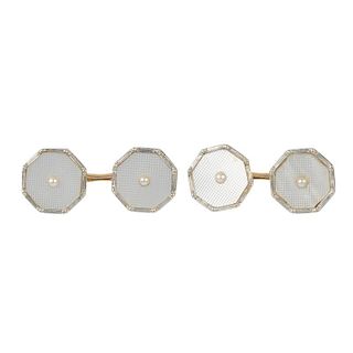 A pair of early 20th century 9ct gold and platinum, mother-of-pearl and split pearl cufflinks. Each