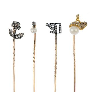 A selection of four late 19th century to early 20th century stickpins. To include a gold cultured pe