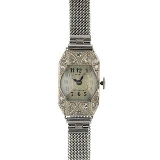 A lady's early 20th century platinum diamond cocktail watch, with associated 9ct gold bracelet. The