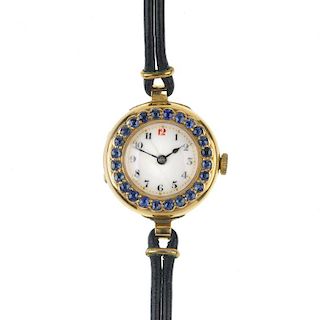 A lady's early 20th century 18ct gold manual wind cocktail watch. The circular-shape cream dial, wit