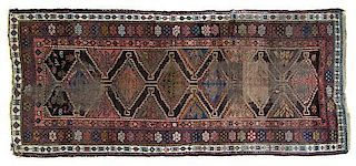 A Mosul Wool Rug, CIRCA 1920, 8 feet 4 inches x 3 feet 7 inches.