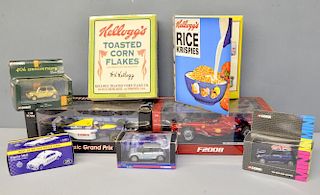McLaren M16 racing car, a Jaguar coupe, 2 Hotwheels racing cars and a quantity of other cars, all bo