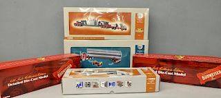 Corgi die-cast model Budweiser Lorry x2, a Heavy Haulers logging truck and two other trucks, all box