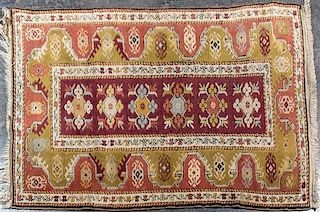 A Persian Wool Rug, 4 feet 6 inches x 3 feet 1 inch.