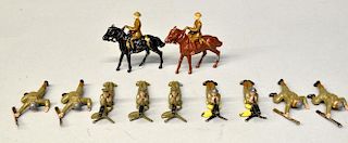 Britains, two mounted officers, four with machine guns and four crawling figures,