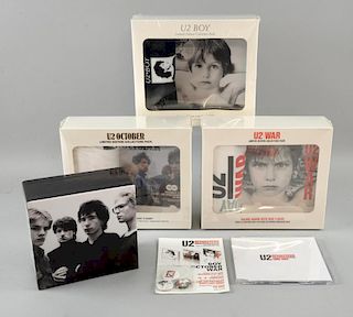 U2 Promotional items including, the first 3 albums remastered in presentation boxes with t shirts, C