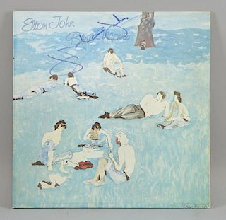 Elton John, Blue Moves, vinyl LP cover signed to the front in blue.Provenance: From a single owner c
