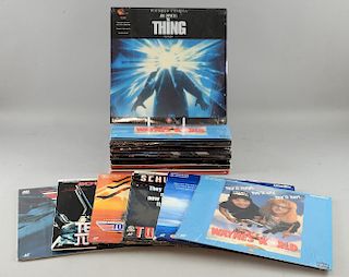 24 Laser Dics including Rambo, The Thing, Jurassic Park, Terminator 2 & others, some sealed