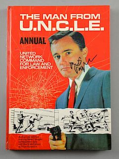 The Man From U.N.C.L.E. 1966 annual signed on the front cover by Robert Vaughn.Provenance: This lot
