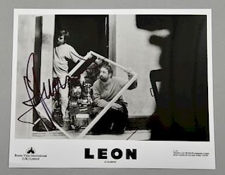 Leon promotional photograph signed by Luc Besson, 10 x 8 inches.Provenance: This lot has been consig