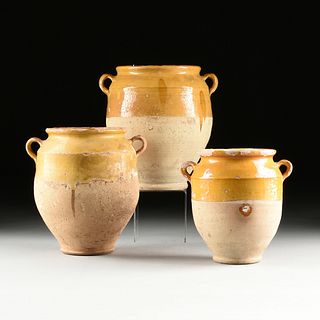 THREE FRENCH PROVINCIAL STYLE YELLOW GLAZED TERRACOTTA CONFIT JARS, 20TH CENTURY,