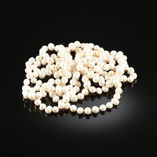 A ROPE OF CREAM WHITE BAROQUE PEARLS ON SILK, 20TH CENTURY,
