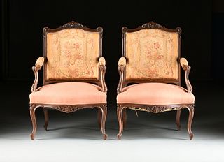 A PAIR OF LOUIS XV STYLE FLORAL TAPESTRY UPHOLSTERED WALNUT FAUTEUILS, FOURTH QUARTER 19TH CENTURY,