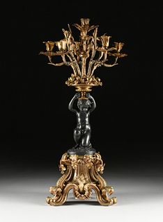 A BELLE ÉPOQUE GILT AND PATINATED BRONZE FIVE-LIGHT FIGURAL CANDELABRUM, LATE 19TH CENTURY,