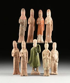 A GROUP OF NINE CHINESE TANG AND MING DYNASTY STYLE POTTERY ATTENDANT FIGURES, POSSIBLY AD 618 -
