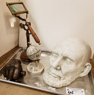TRAY DESK ITEMS MAGNIFIER ON STAND, GLOBE 6 1/2", LINCOLN PLASTER DEATH MASK AND COPPER PLATED PLASTER HAND OF LINCOLN COPYRIGHT 1886