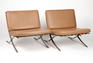 A pair of ''Barcelona''-style lounge chairs