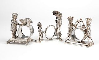 3 Victorian figural silver-plated napkin rings