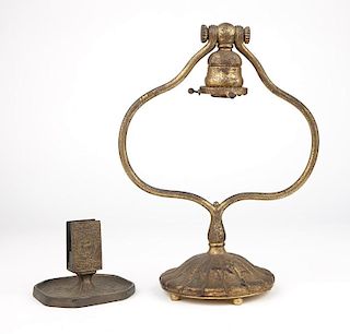 A Tiffany Studios lamp and Zodiac match holder