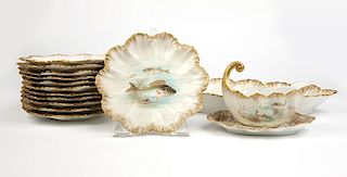An A. Lanternier Limoges porcelain fish service