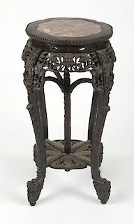 A Chinese export carved hardwood plant stand