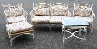Five Piece Outdoor Lot, to include a loveseat, pair of armchairs, ans ottoman, all having cushions and rush seats; along with a glass top side table, 