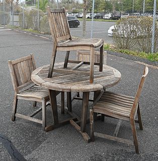 New River Brazilian Cherry Outdoor Round Table, and four chairs, height 30 inches, diameter 48 inches.