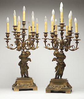 A pair of French gilt-bronze candelabra