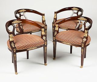 Four gilt bronze-mounted Empire-style armchairs