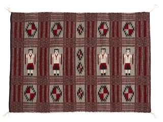 A Navajo Two-Faced Yei saddle blanket