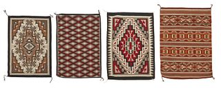 A group of Navajo rugs