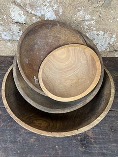 Four Wooden Bowls