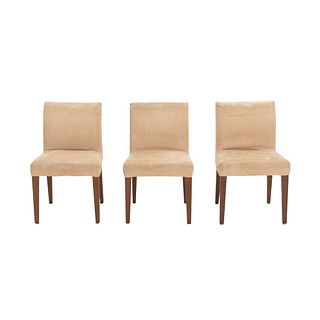 Lote de 3 sillas. México. sXX. Elaboradas en madera. Con tapicería de tela color beige.