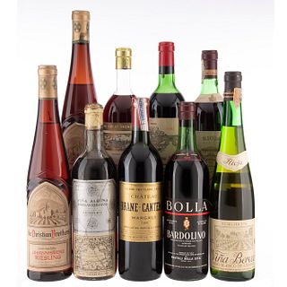 Lote de Vinos Tintos y Blancos de Francia, U.S.A., Italia y España. Haut - Sauternes. En presentaciones de 750 ml. Total de piezas: 9.