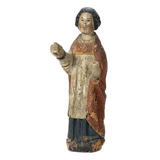 A Spanish Colonial Carved and Painted Figure of a Saint