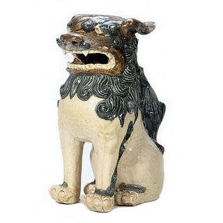 A Chinese Ceramic Fu Dog