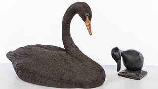 Boby Ackiss Carving of a Swan and a Cast Iron Duck